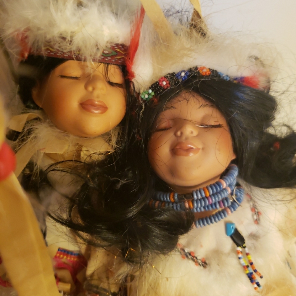 2 goldenvale native American porcelain dolls on a dreamcatcher swing with cert.